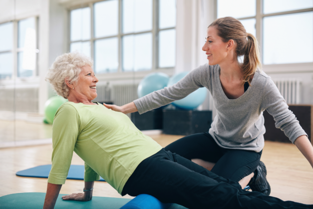 Benefits of Physical Therapy for Older Adults Blog Photo A senior smiling at Synergy Physical Therapy and Wellness experiencing the benefits of Physical Therapy for Older Adults